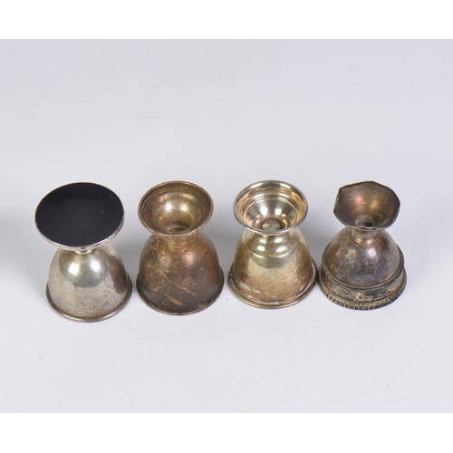 61 - Three silver egg cups. One weighted. Total weight 142.7g.