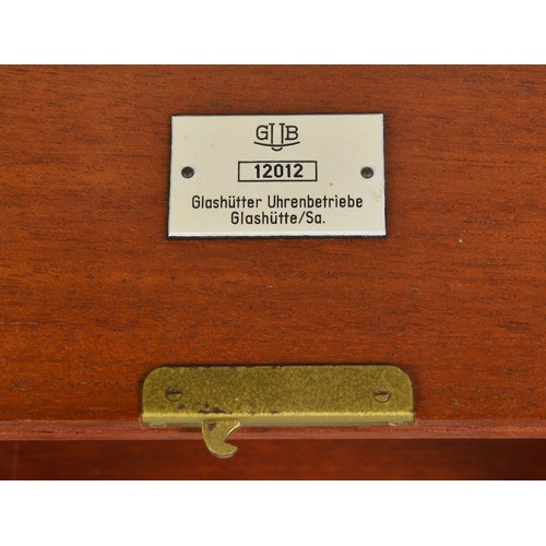 A Ship's Clock in a Mahogany Case by 
