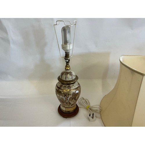 781 - A Japanese Satsuma design Table Lamp depicting a Group of Warriors & Attendants coming down a mounta... 