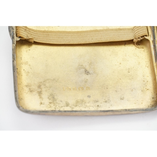 48 - A 1911 silver cigarette case by Thomas Bishton. Featuring floral and scroll design. Weight 90g.