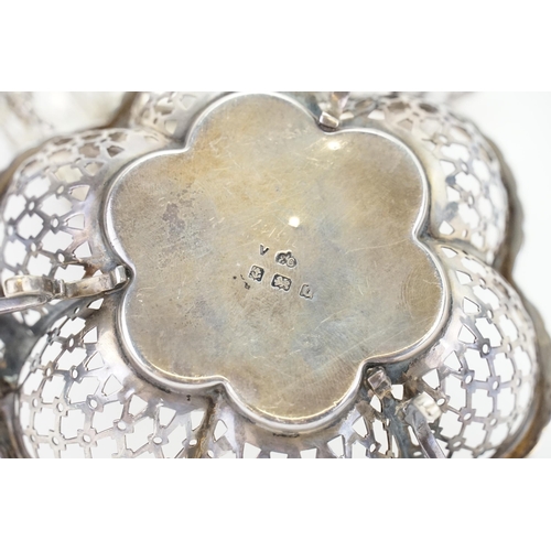 49 - A pair of silver 1938 bon bon dishes, with pierced design. Weight 99.3g.