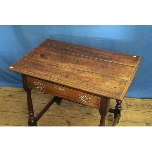 572 - An Antique Jacobean Side Table with a Single Drawer, Turned legs & Cross Stretcher. Measuring: 86cms... 