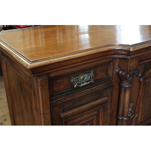 581 - A Victorian Mahogany & Carved Panelled Shaped Front Sideboard. Measuring: 150cms across x 94cms High... 