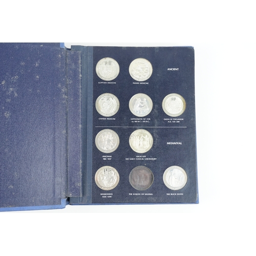 45 - A limited edition collection of medallic history of medicine sterling silver medals. The collection ... 