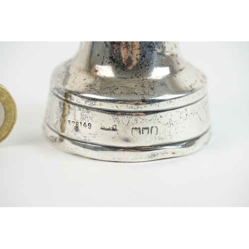 55 - A interesting silver oil lamp, designed as a lighthouse. The lighthouse features ruby coloured glass... 