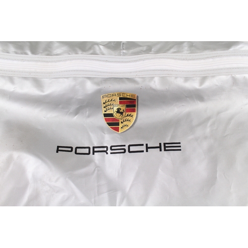 560 - An Original Porsche Cayman Car Cover in Outer Sleeve.