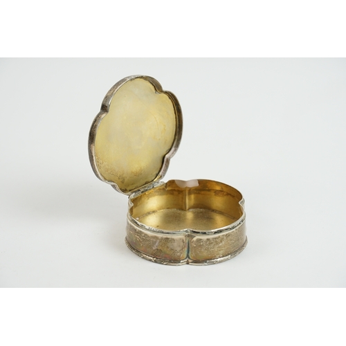 57 - A Edwardian silver and enamelled trinket box by Liberty & Co. The box is set with lavender colour en... 