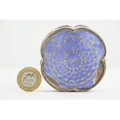 57 - A Edwardian silver and enamelled trinket box by Liberty & Co. The box is set with lavender colour en... 