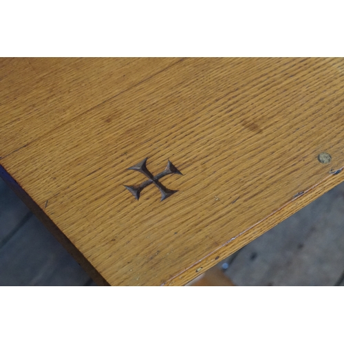 614 - An Oak Refectory Topped Dining Table resting on a shaped Base. Measuring: 76cms across x 185cms long... 