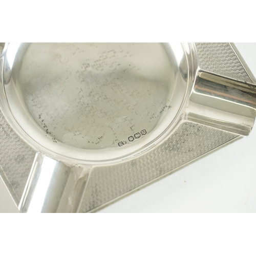 47 - A Elizabeth II period Silver Ash tray by Viner's Ltd. The ash tray features engine turned decoration... 