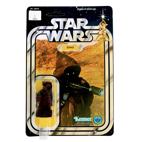 A RARE Vintage 1977 "Kenner Star Wars Jawa" in original UNOPENED packaging, "12 back". The card is unpunched & Jawa has the fabric cape.