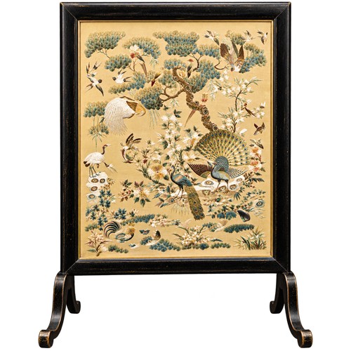 A Chinese embroidered picture depicting peacocks and cranes, fitted into a fire screen. On inspection there is some minor water damage in both bottom corners. Pictures to be attached. Embroidery Size: 44cms x 56cms.