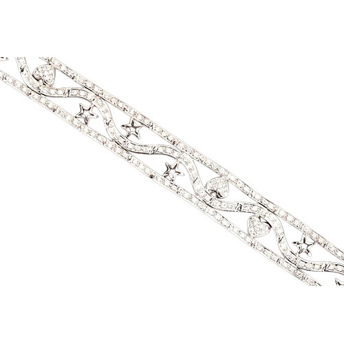A Lovely 18ct White Gold Diamond Bracelet set with love hearts & Stars. Measuring: 18cms Long. Weighing: 37.2 grams.