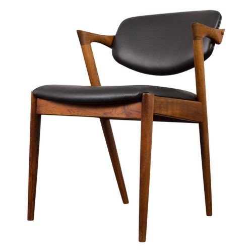 A Set of 11 x 1960s Dining Chairs made by "Kai Kristiansen" in Excellent Condition. There appears to be 6 in a Dark Rosewood & 5 in a Light Wood, possibly purchased at a later date or could be sun faded. One chair has slight damage/repaired.