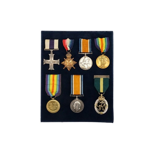 A Collection of World War I medals awarded to "Major H. F. Ling" (4th Suffolk Regiment) to include a Military Cross awarded on the 18th August 1916, 1914-1920 War Medal, a 1914 Star (Lieut), a Victory Medal (Major) along with medals for "Captain G.A. Ling" to include a Victory Medal, 1914-1920 War Medal & a GVI Territorial Decoration Medal, contained in a Wooden Frame.