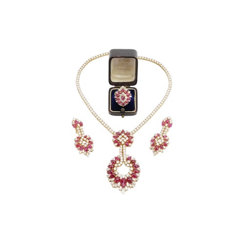An incredible 18ct diamond and ruby three-piece jewellery suite, consisting of 238 diamonds & 90 cabochon rubies. The necklace was designed & supplied by diamond & gemstone expert Richab s.a. in Switzerland Geneve in 1982. Original invoice & purchase receipt provided.

The ring is set in 18ct yellow gold. Set with 24 diamonds & 11 cabochon rubies.
There are 10 brilliant cut diamonds and 14 marquise diamonds. The largest brilliant cut diamond approx. 0.1ct. The largest marquise diamond approx. 2.4mm x 3.5mm.
Set with 11 cabochon pear cut rubies. The largest approx. 7mm x 4.7mm.
The size of the ring is approx. 27mm x 21mm. Ring size N. The weight of the ring is 11.5g. 

The earrings are set in 18ct yellow gold. Set with 35 diamonds and 12 rubies each. The earrings have a pierced back. The earring drop is approx. 5.4cm.
There are 17 round brilliant cut diamonds the largest approx. 0.1ct. There are 18 marquise diamonds, the largest approx. 2.6mm x 4.8mm. 
Set with 12 cabochon pear cut rubies. The largest approx. 0.4ct and the smallest 0.3ct. 5mm x 6.6mm.
Each earrings weighs approx. 14g. 

The centre piece of the necklace consists of 22 cabochon rubies and 70 diamonds. 
There are 22 pear cut cabochon rubies, the largest approx. 6.6mm x 12mm with the depth approx. 5.4mm. 
There are 37 brilliant cut diamonds, the largest approx. 0.15ct. There are 33 marquise diamonds, the largest approx. 6.3mm x 3.8mm. The pendant drop is 8.8cm. 

The tennis necklace is set in 18ct yellow gold, consisting of 109 brilliant cut diamonds, the largest approx. 0.15ct. The chain length is approx. 19.5cm long each side. The diamonds ascend in size.

Please note: The two small ring box's are not included.