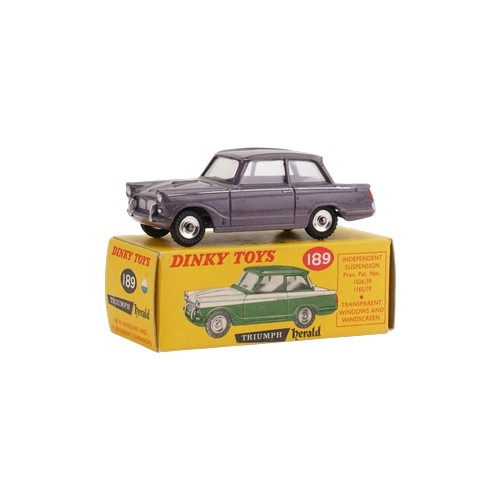 A Scarce model of a Dinky No: 189 "Triumph Herald" finished in TARGO PURPLE. The model is in Very Near Mint Original Condition & comes in an Excellent Original Box. This model has come from it's Original Owner whose Father owned a Triumph Car Dealership in 1959. This model would have been purchased through the Parts Department & was not available to buy in Toy Shops in this scarce colour. A Very Rare Find!!