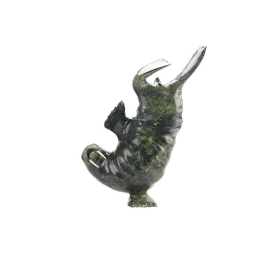 A Large Impressive Inuit Eskimo Sculpture of a Dancing Walrus by Nuna Parr, Cape Dorset, Canada. The Walrus is carved from a large piece of Serpentine & Bone Tusks. Weight: 43kg - 74cms High x 58cms Across. This lot comes complete with a wooden shipping crate.