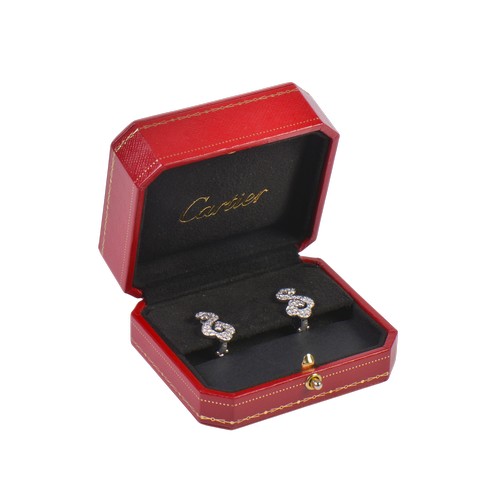 A Pair of "Cartier" 18ct White Gold & Diamond Clip-On Earrings with a Floral Scroll design, contained in a "Cartier" Box. Reference No: 68521A.