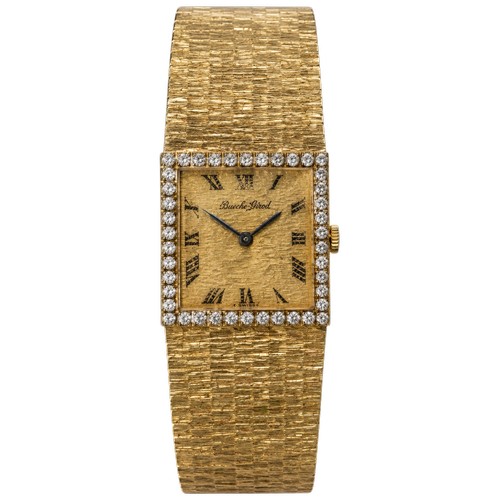 A "Bueche-Girod" Diamond set Bark effect Flexible Link 18ct Gold Wristwatch with Black Numerals contained in the Original Box. Weighing: 74 Grams. (Gross).