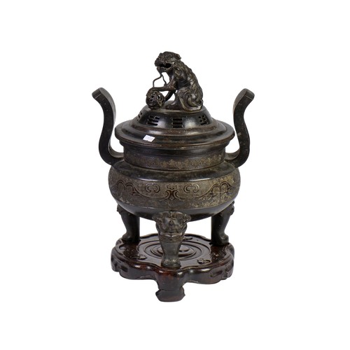 A Japanese Incense Burner decorated with a Kylin, Wave & Clouds, Three Grotesque Feet & Wooden Plinth. Measuring: 50cms High. (Including Stand).