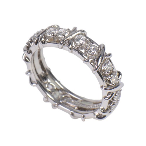 Sixteen Stone by Tiffany & Co. Schlumberger diamond ring, beautifully crafted in a platinum setting. Designed with 18 round brilliant-cut diamonds, showcasing the iconic Schlumberger cross-stitch motif. Presented in its original Tiffany & Co ring box. Ring size S. Total weight 11.2g.