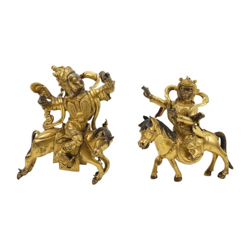 A Pair of Chinese Tibetan 18th century Gilt Bronze Riders on Horseback in amongst the cloud pattern with Breast plates & Chain Mail with Buddha's hands. Measuring: 11cms. Along with an Opium Pipe.