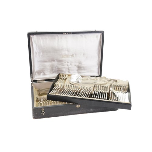 Large German .800 silver canteen of cutlery, the pieces marked “800” with chalice mark and “Handgeschmiedet”, housed within a black leatherette fitted case. Comprising an extensive assortment of knives, forks, spoons and serving pieces. Case with age-related wear. Weight without knives, 4,066g