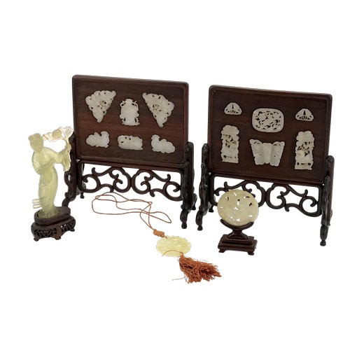 A Pair of Chinese Jade Mutton Fat designed Table Screens decorated with Panels of Figures, Butterflies, Deer, Fish, Two Jade Panels, Pendants & a Figure Lohun.

The Sizes are as follows:

Two Moths: 2.1 inches wide 
One gentleman: 1.5 inches high
Two chickens: 1.45 inches wide
One dragon: 1.5 inches wide
Two fish: 1 inch wide
One bird: 1.56 inches wide
Two deer: 2 inches high
One butterfly: 1.7 inches wide.