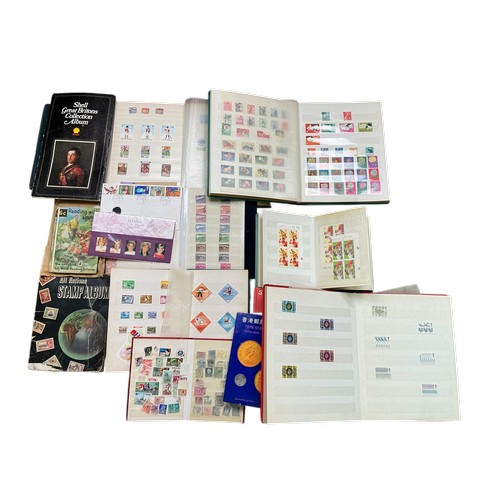 A Large Collection of Stamps to include Eight Albums of Chinese, Hong Kong, etc.
