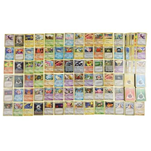 A Collection of Pokémon Trading Cards from the Gardivoir and Blaziken Ex Battle Stadium Box (Unseen Forces, Ex Sandstorm, Ruby Sapphire, Legend Maker) series, comprising a quantity of cards including common, uncommon, rare and holographic. To include a Lugia Ex from the set Unseen Forces, 3 Legend Maker stamped Holographics featuring Absolve, Spheal and Trapinch, Six Unseen Forces Stamped Pokeball design Holographics featuring Slugma, Clefable, Potion Trainer, Pokeball Trainer, Mareep and Jynx, the Box's original Gardevoir holographic, a Sudowoodo holographic and a Flareon Holographic. Also including Rare non-holographic cards such as Espeon and Eevee cards alongside the original Gardevoir and Blaziken ex Battle Stadium box and other cards from their era. Viewing recommended on this Pokemon Lot.