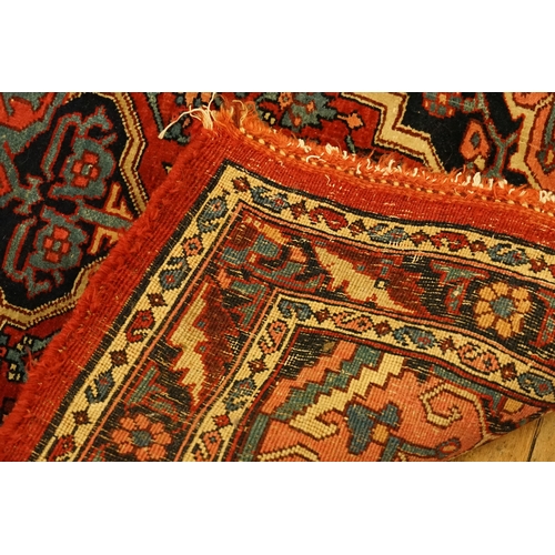 A small hand knotted Persian wool rug, probably North West Persian ...
