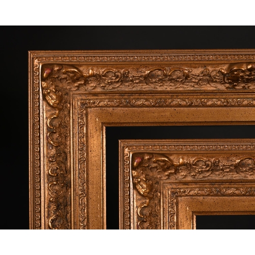 607 - 20th Century English School. A Gilt Composition Frame, with swept centres and corners, rebate 20” x ... 