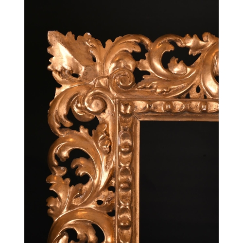 613 - 19th Century Italian School. A Carved Giltwood Florentine Frame, rebate 27” x 21.5” (68.5 x 54.7cm)