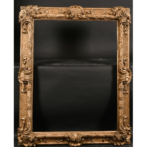 407 - 19th Century Italian School. An Elaborate Carved Giltwood Florentine Frame, with swept centres and c... 