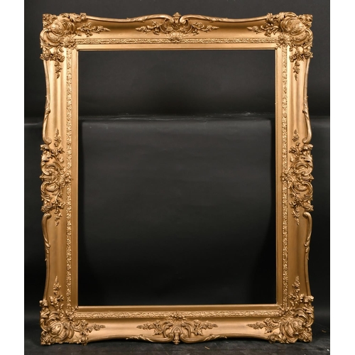 417 - 19th Century English School. A Gilt Composition Frame, with swept centres and corners, rebate 36” x ... 