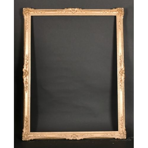 428 - 20th Century English School. A Gilt Composition Frame, with swept centres and corners, rebate 34.25”... 