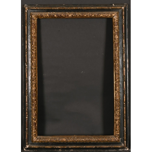 460 - 17th Century Italian School. A Carved Giltwood Frame, with Black Panels, rebate 28.25” x 18.5” (71.8... 