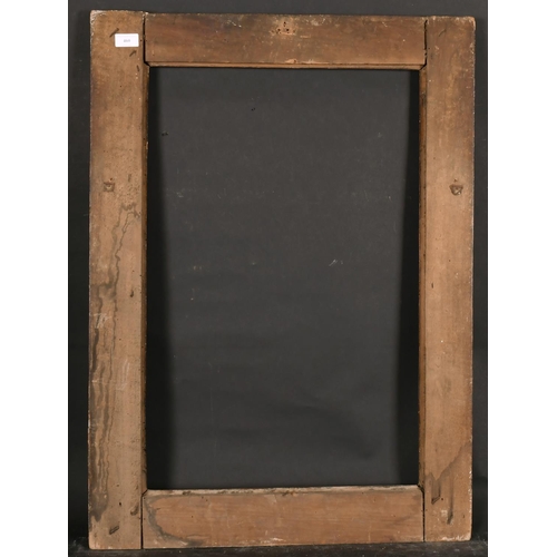 460 - 17th Century Italian School. A Carved Giltwood Frame, with Black Panels, rebate 28.25” x 18.5” (71.8... 