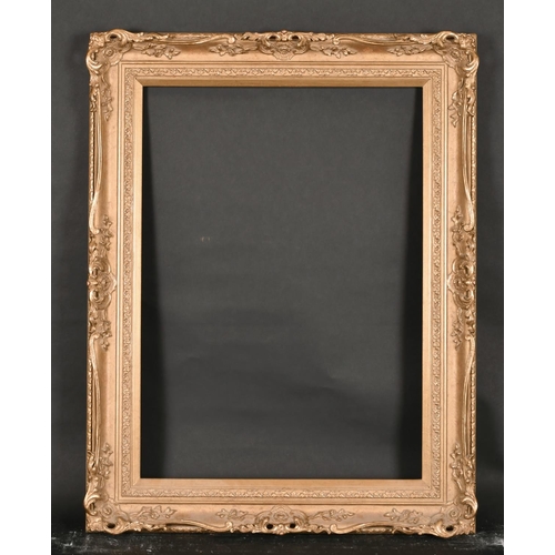 479 - 20th Century English School. A Gilt Composition Frame, with swept and pierced centres and corners, r... 