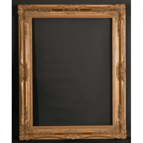 493 - 20th Century English School. A Gilt Composition Frame, with swept centres and corners, rebate 24” x ... 