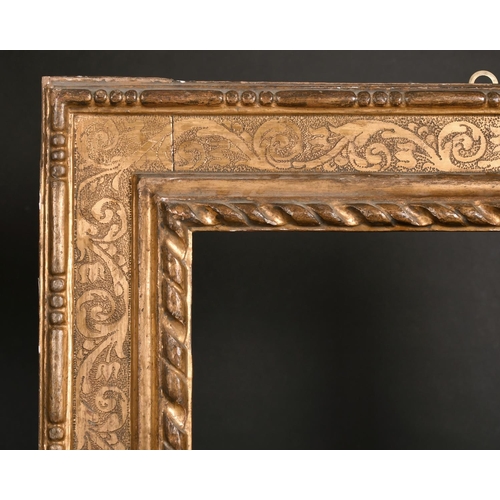 512 - 20th Century Italian School. A 17th Century Style Italian Plate Frame, rebate 21” x 18.5” (53.3 x 47... 