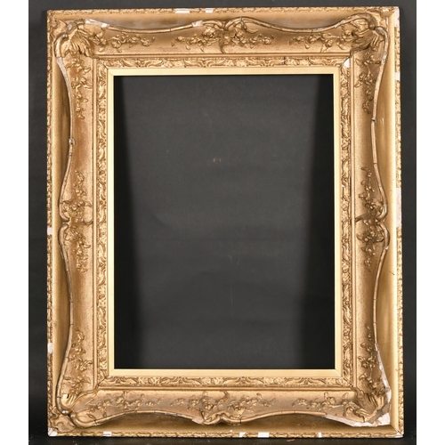 517 - 19th Century English School. A Gilt Composition Frame, with swept centres and corners, rebate 20” x ... 