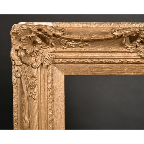 532 - 19th Century English School. A Gilt Composition Frame, with pierced and swept centres and corners, r... 