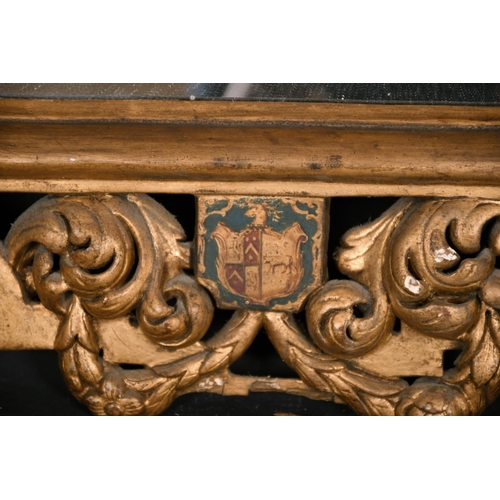 539 - 18th Century European School. A Carved Giltwood Baroque Frame, with a Heraldic Plaque, and inset mir... 