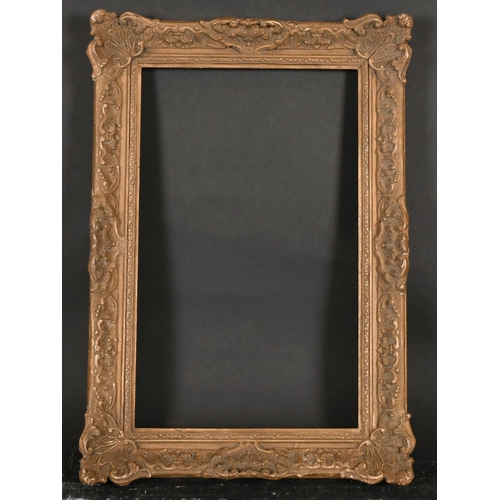 544 - 20th Century English School. A Gilt Composition Frame, with swept centres and corners, rebate 16” x ... 