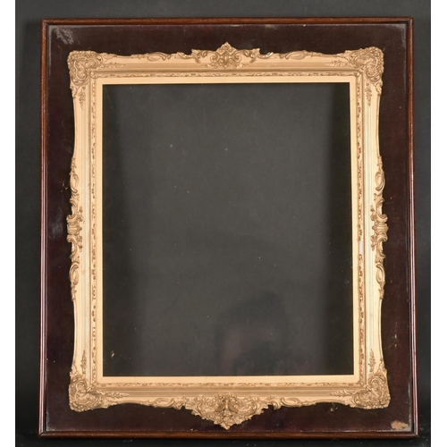 555 - 19th Century English School. A Gilt Composition Frame, with swept centres and corners, inside a glaz... 