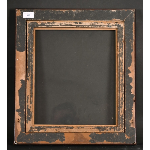 555 - 19th Century English School. A Gilt Composition Frame, with swept centres and corners, inside a glaz... 