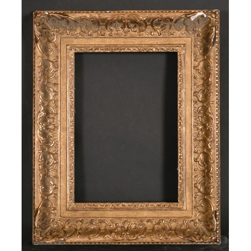 563 - 19th Century French School. A Gilt Composition Frame, with swept corners, rebate 12.5” x 8.5” (31.7 ... 