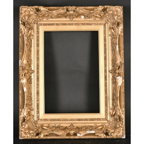 564 - 19th Century English School. A Gilt Composition Frame, with pierced and swept centres and corners, r... 